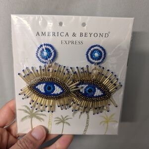 America & Beyond Express Blue and Gold Eye Earrings